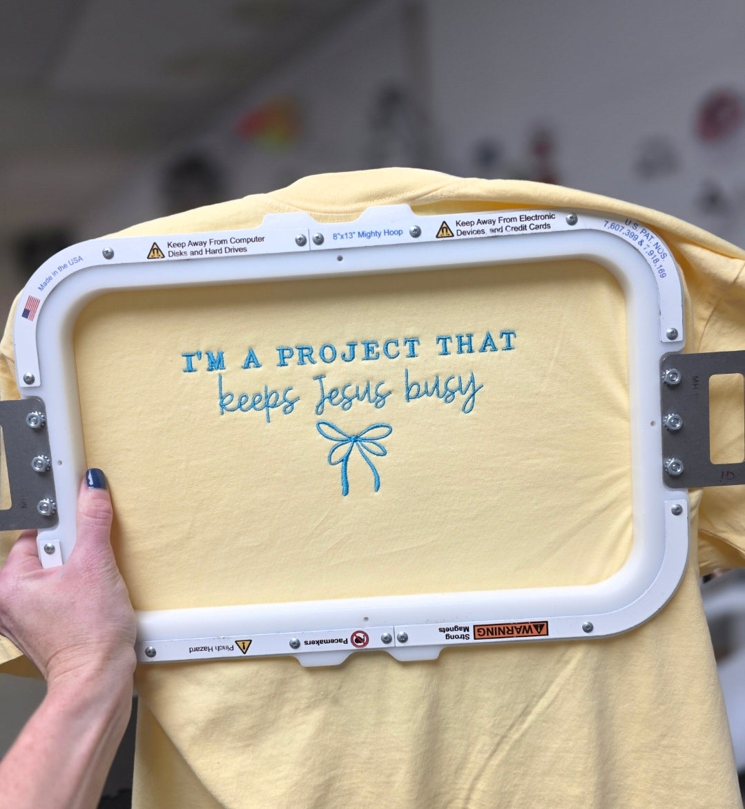 Im a Project that keeps Jesus Busy Tee